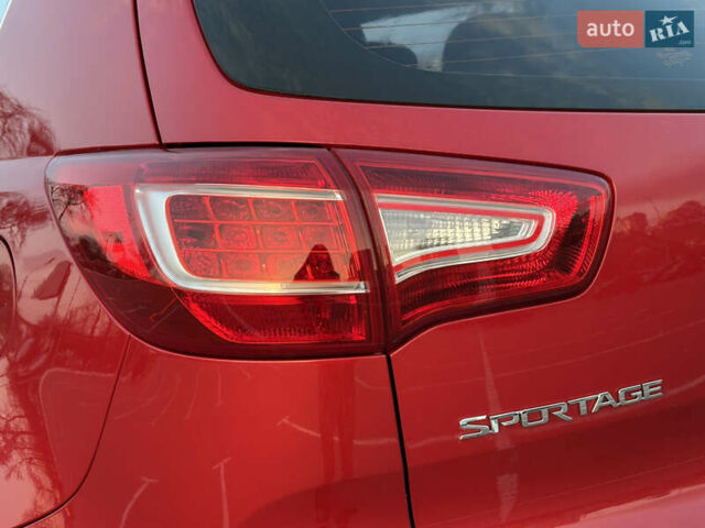 Червоний Кіа Sportage, об'ємом двигуна 2 л та пробігом 150 тис. км за 13500 $, фото 24 на Automoto.ua