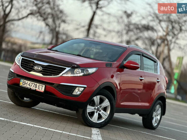 Червоний Кіа Sportage, об'ємом двигуна 2 л та пробігом 150 тис. км за 13500 $, фото 6 на Automoto.ua