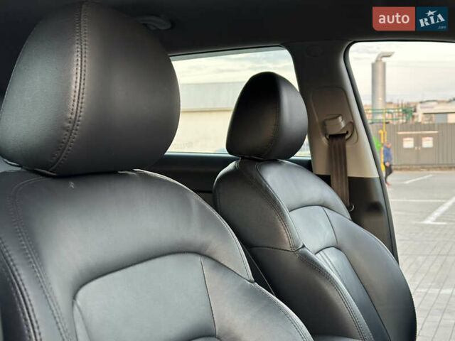 Червоний Кіа Sportage, об'ємом двигуна 2 л та пробігом 150 тис. км за 13500 $, фото 49 на Automoto.ua