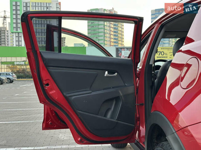 Червоний Кіа Sportage, об'ємом двигуна 2 л та пробігом 150 тис. км за 13500 $, фото 36 на Automoto.ua