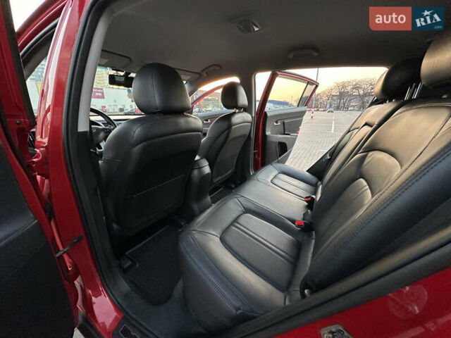Червоний Кіа Sportage, об'ємом двигуна 2 л та пробігом 150 тис. км за 13500 $, фото 39 на Automoto.ua
