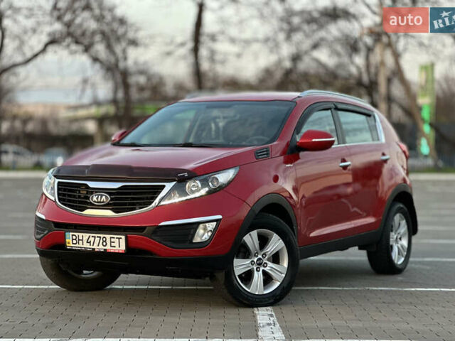 Червоний Кіа Sportage, об'ємом двигуна 2 л та пробігом 150 тис. км за 13500 $, фото 5 на Automoto.ua