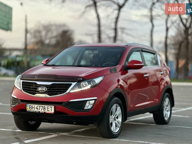 Червоний Кіа Sportage, об'ємом двигуна 2 л та пробігом 150 тис. км за 13500 $, фото 20 на Automoto.ua