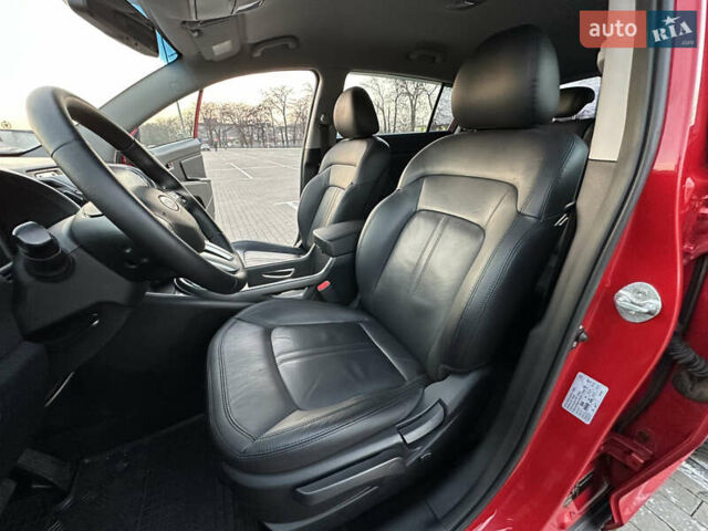 Червоний Кіа Sportage, об'ємом двигуна 2 л та пробігом 150 тис. км за 13500 $, фото 52 на Automoto.ua