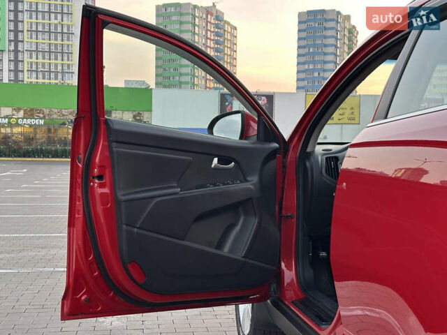 Червоний Кіа Sportage, об'ємом двигуна 2 л та пробігом 150 тис. км за 13500 $, фото 50 на Automoto.ua