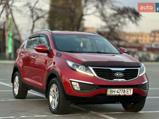 Червоний Кіа Sportage, об'ємом двигуна 2 л та пробігом 150 тис. км за 13500 $, фото 19 на Automoto.ua