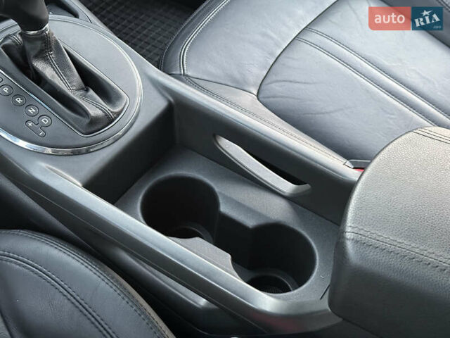 Червоний Кіа Sportage, об'ємом двигуна 2 л та пробігом 150 тис. км за 13500 $, фото 68 на Automoto.ua