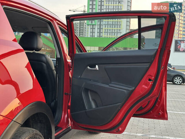 Червоний Кіа Sportage, об'ємом двигуна 2 л та пробігом 150 тис. км за 13500 $, фото 32 на Automoto.ua