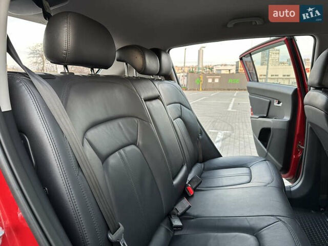 Червоний Кіа Sportage, об'ємом двигуна 2 л та пробігом 150 тис. км за 13500 $, фото 35 на Automoto.ua