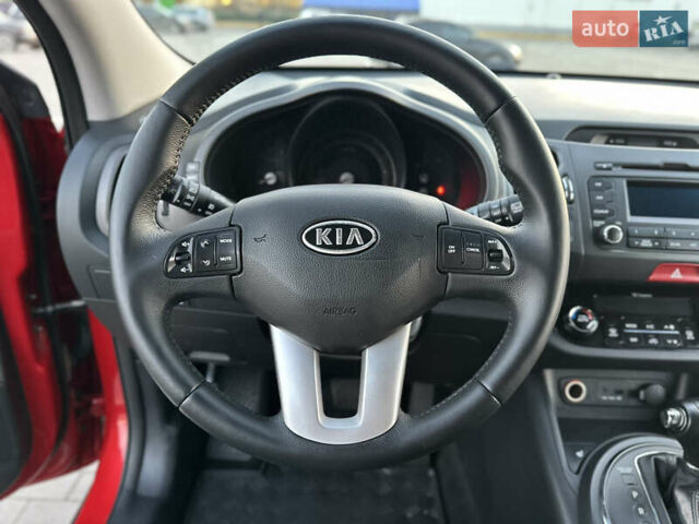 Червоний Кіа Sportage, об'ємом двигуна 2 л та пробігом 150 тис. км за 13500 $, фото 58 на Automoto.ua