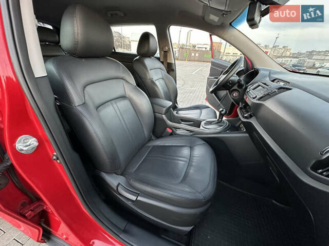 Червоний Кіа Sportage, об'ємом двигуна 2 л та пробігом 150 тис. км за 13500 $, фото 45 на Automoto.ua