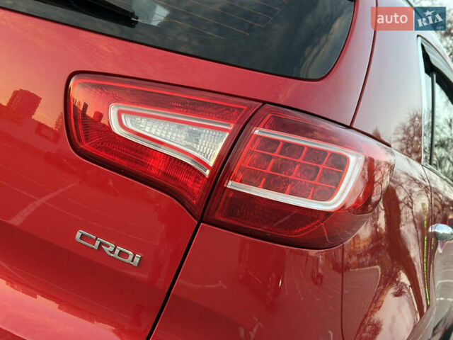 Червоний Кіа Sportage, об'ємом двигуна 2 л та пробігом 150 тис. км за 13500 $, фото 25 на Automoto.ua