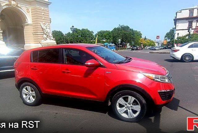 Красный Киа Sportage, объемом двигателя 2.4 л и пробегом 300 тыс. км за 10500 $, фото 5 на Automoto.ua