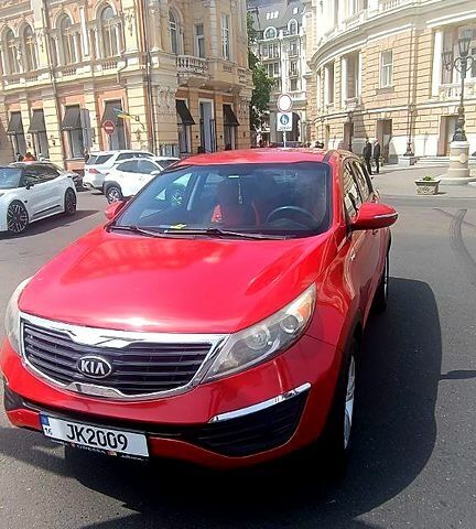 Красный Киа Sportage, объемом двигателя 2.4 л и пробегом 300 тыс. км за 10500 $, фото 1 на Automoto.ua