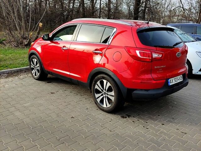 Червоний Кіа Sportage, об'ємом двигуна 2.4 л та пробігом 106 тис. км за 12000 $, фото 5 на Automoto.ua