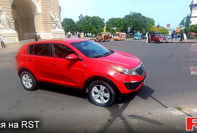 Красный Киа Sportage, объемом двигателя 2.4 л и пробегом 300 тыс. км за 10500 $, фото 6 на Automoto.ua