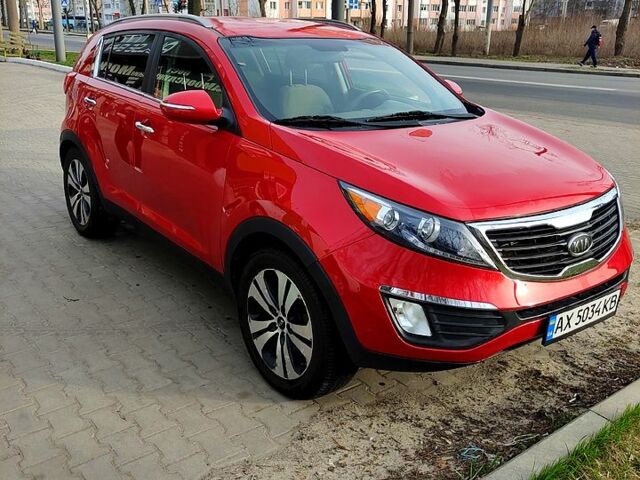 Красный Киа Sportage, объемом двигателя 2.4 л и пробегом 106 тыс. км за 12000 $, фото 9 на Automoto.ua