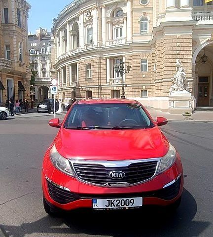 Красный Киа Sportage, объемом двигателя 2.4 л и пробегом 300 тыс. км за 10500 $, фото 2 на Automoto.ua