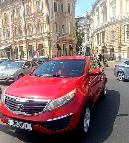 Красный Киа Sportage, объемом двигателя 2.4 л и пробегом 300 тыс. км за 10500 $, фото 3 на Automoto.ua
