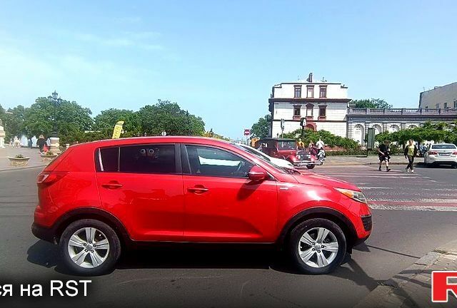 Красный Киа Sportage, объемом двигателя 2.4 л и пробегом 300 тыс. км за 10500 $, фото 8 на Automoto.ua