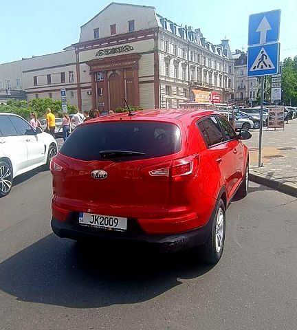 Красный Киа Sportage, объемом двигателя 2.4 л и пробегом 300 тыс. км за 10500 $, фото 10 на Automoto.ua