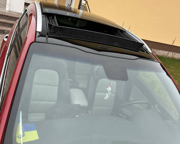 Червоний Кіа Sportage, об'ємом двигуна 2 л та пробігом 132 тис. км за 19300 $, фото 8 на Automoto.ua