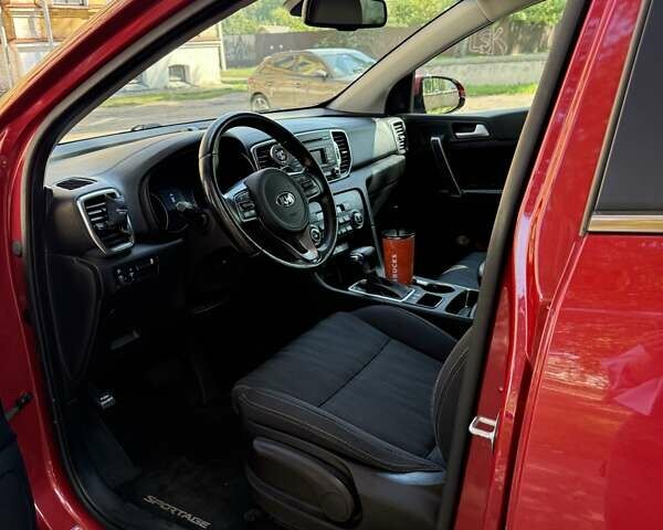 Червоний Кіа Sportage, об'ємом двигуна 2 л та пробігом 138 тис. км за 17500 $, фото 6 на Automoto.ua