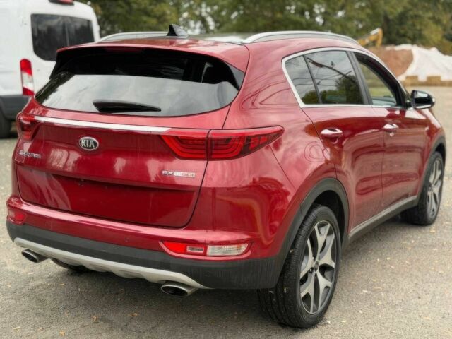 Красный Киа Sportage, объемом двигателя 2 л и пробегом 51 тыс. км за 10000 $, фото 7 на Automoto.ua