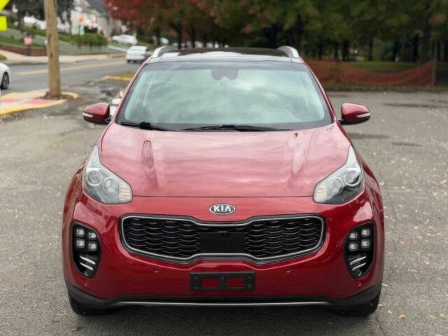 Красный Киа Sportage, объемом двигателя 2 л и пробегом 51 тыс. км за 10000 $, фото 1 на Automoto.ua