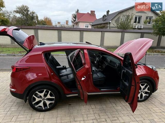 Червоний Кіа Sportage, об'ємом двигуна 2 л та пробігом 97 тис. км за 21800 $, фото 72 на Automoto.ua