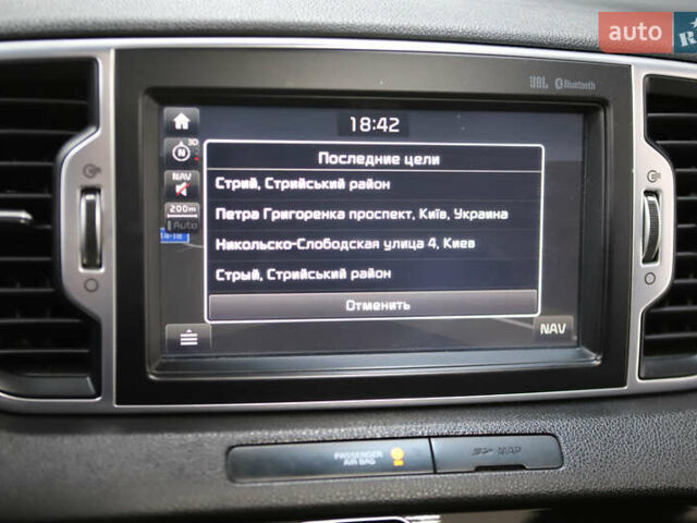 Красный Киа Sportage, объемом двигателя 2 л и пробегом 144 тыс. км за 21800 $, фото 76 на Automoto.ua