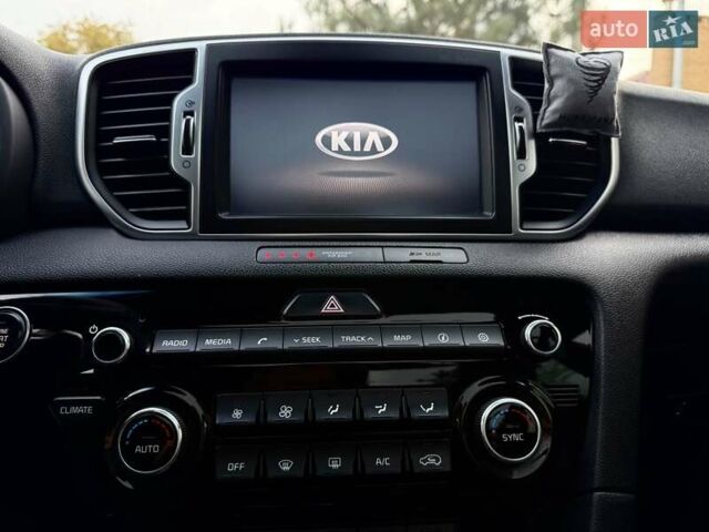 Червоний Кіа Sportage, об'ємом двигуна 2 л та пробігом 97 тис. км за 21800 $, фото 88 на Automoto.ua