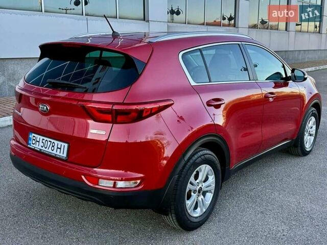 Червоний Кіа Sportage, об'ємом двигуна 1.69 л та пробігом 58 тис. км за 18800 $, фото 3 на Automoto.ua