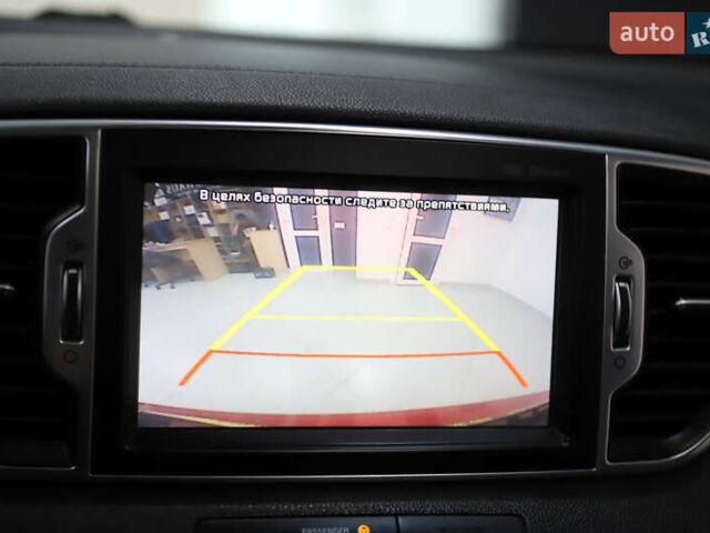 Красный Киа Sportage, объемом двигателя 2 л и пробегом 144 тыс. км за 21800 $, фото 75 на Automoto.ua