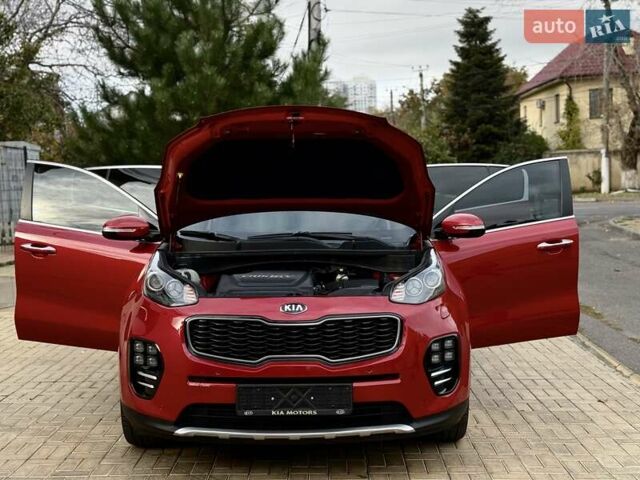 Червоний Кіа Sportage, об'ємом двигуна 2 л та пробігом 97 тис. км за 21800 $, фото 76 на Automoto.ua