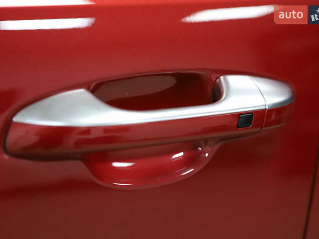 Красный Киа Sportage, объемом двигателя 2 л и пробегом 144 тыс. км за 21800 $, фото 17 на Automoto.ua