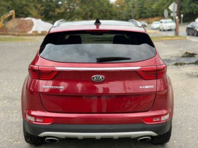 Красный Киа Sportage, объемом двигателя 2 л и пробегом 51 тыс. км за 10000 $, фото 6 на Automoto.ua