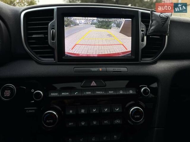 Червоний Кіа Sportage, об'ємом двигуна 2 л та пробігом 97 тис. км за 20700 $, фото 75 на Automoto.ua