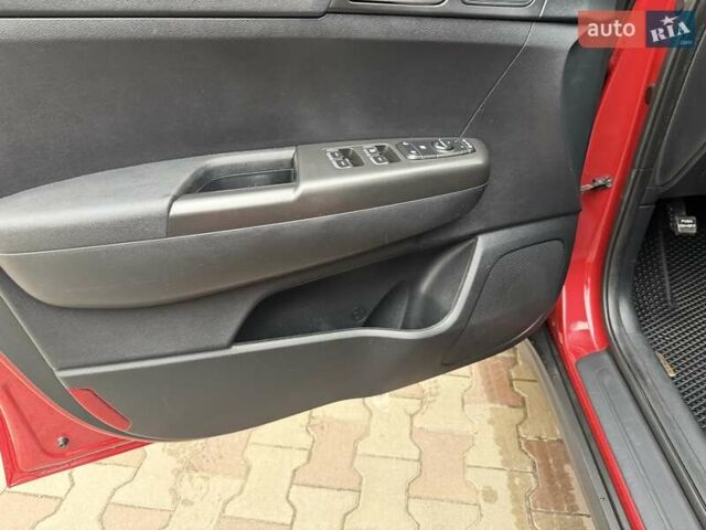 Красный Киа Sportage, объемом двигателя 2 л и пробегом 110 тыс. км за 17600 $, фото 9 на Automoto.ua