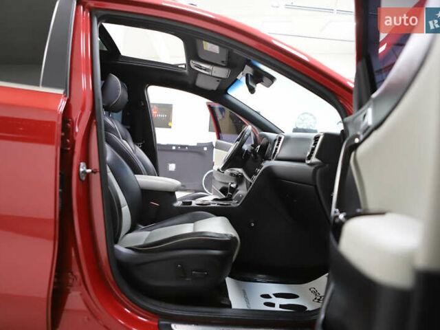 Красный Киа Sportage, объемом двигателя 2 л и пробегом 144 тыс. км за 21800 $, фото 88 на Automoto.ua