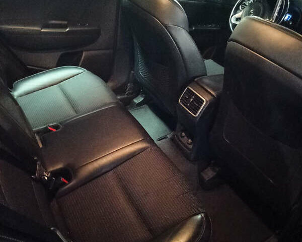 Красный Киа Sportage, объемом двигателя 2 л и пробегом 157 тыс. км за 22000 $, фото 11 на Automoto.ua