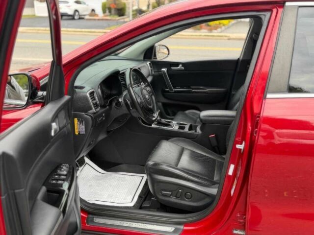 Красный Киа Sportage, объемом двигателя 2 л и пробегом 51 тыс. км за 10000 $, фото 9 на Automoto.ua