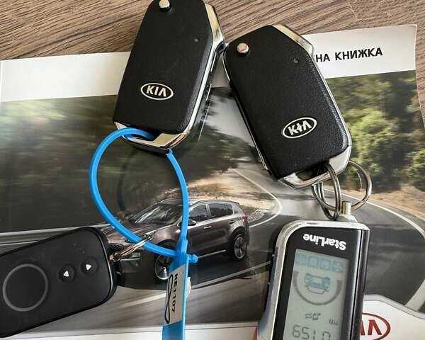 Червоний Кіа Sportage, об'ємом двигуна 1.59 л та пробігом 62 тис. км за 19000 $, фото 17 на Automoto.ua