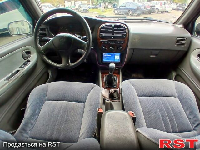 Кіа Sportage, об'ємом двигуна 2 л та пробігом 300 тис. км за 3499 $, фото 2 на Automoto.ua