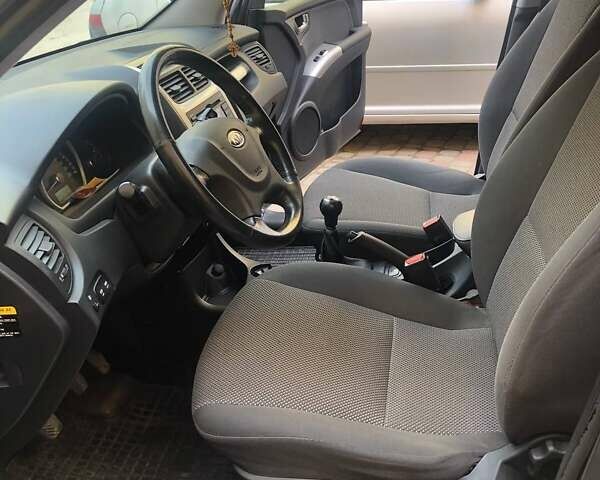 Киа Sportage, объемом двигателя 1.98 л и пробегом 212 тыс. км за 7700 $, фото 11 на Automoto.ua