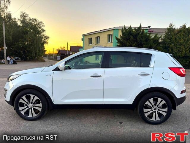 Кіа Sportage, об'ємом двигуна 2 л та пробігом 137 тис. км за 9599 $, фото 2 на Automoto.ua