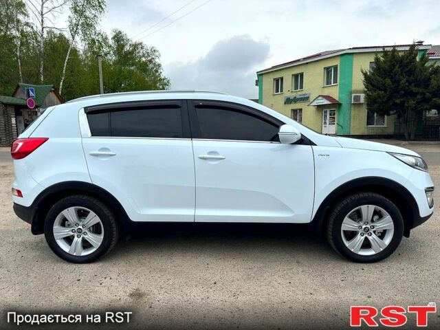 Кіа Sportage, об'ємом двигуна 2 л та пробігом 138 тис. км за 12700 $, фото 4 на Automoto.ua