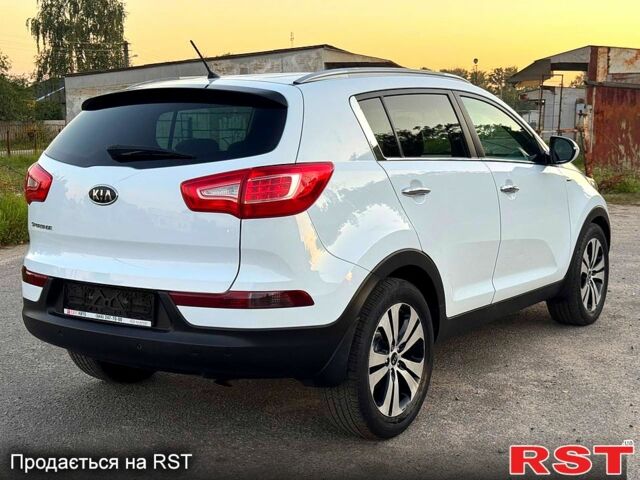 Кіа Sportage, об'ємом двигуна 2 л та пробігом 137 тис. км за 9599 $, фото 4 на Automoto.ua