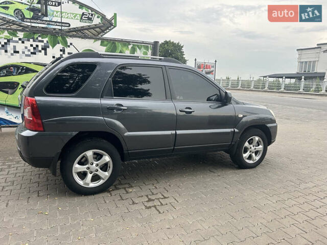 Сірий Кіа Sportage, об'ємом двигуна 2 л та пробігом 220 тис. км за 10200 $, фото 4 на Automoto.ua