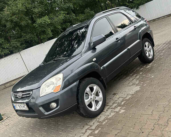 Сірий Кіа Sportage, об'ємом двигуна 2 л та пробігом 220 тис. км за 10200 $, фото 1 на Automoto.ua
